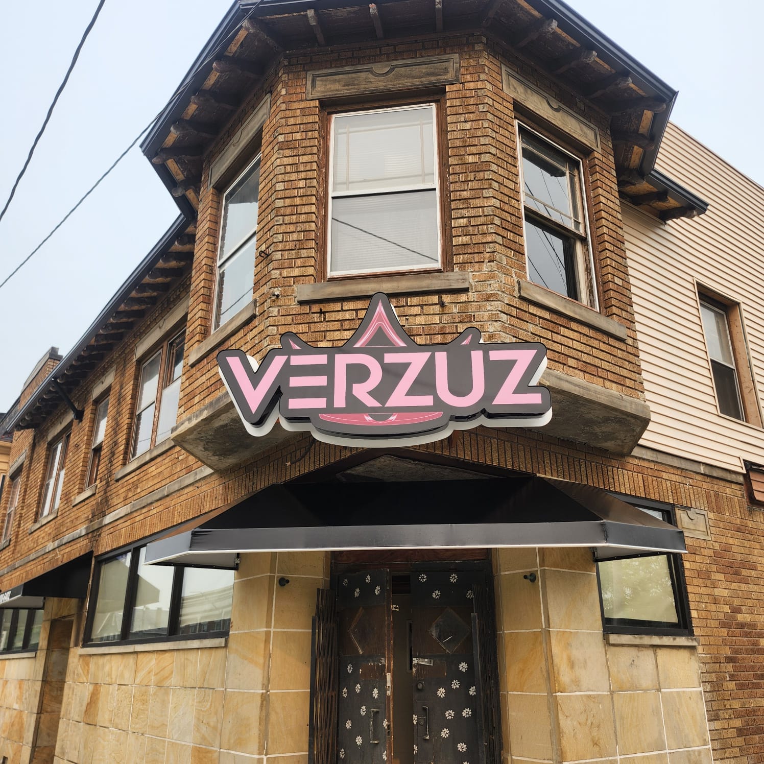 Custom logo-shaped channel letter sign for Verzuz by Bnext Design